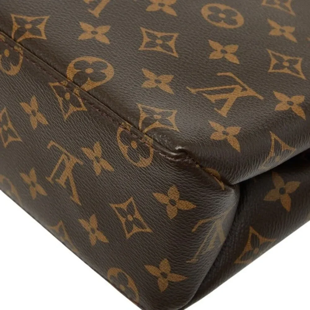 Louis Vuitton Marignan Handbag